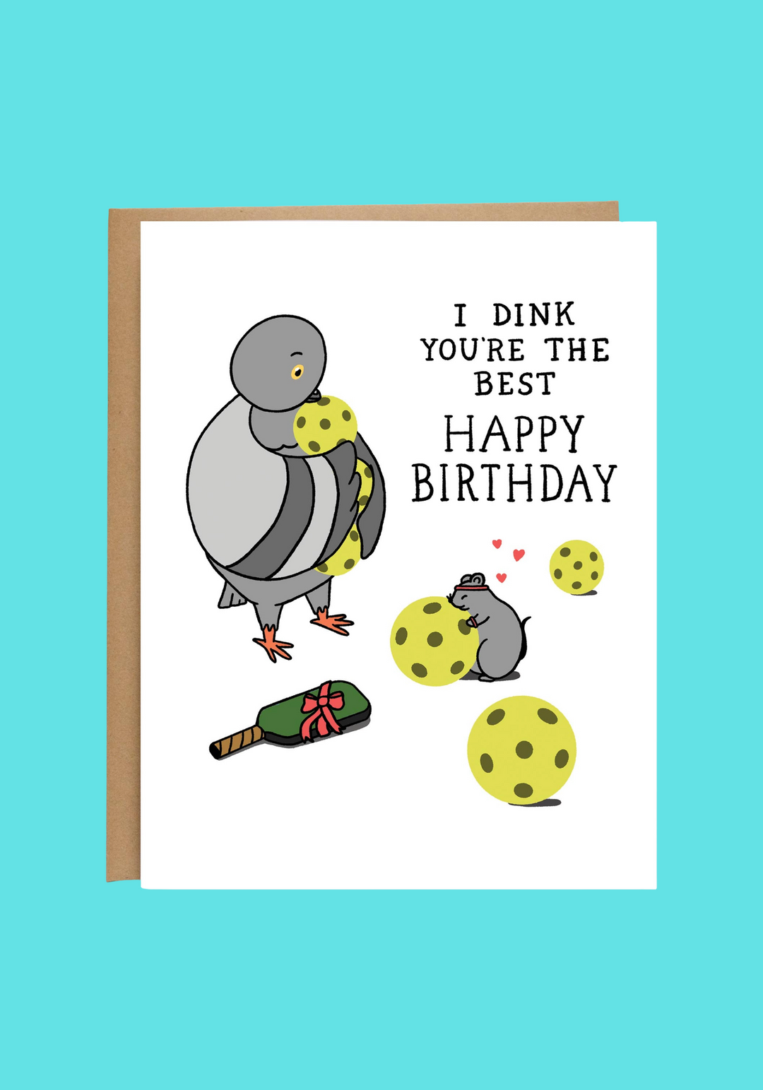 A humorous birthday card featuring a cartoon pigeon holding yellow polka-dot balls, with the text 'I DINK YOU'RE THE BEST HAPPY BIRTHDAY' and a small rat wearing a beer glass on its head. The card is shown with a brown kraft envelope behind it on a white background.